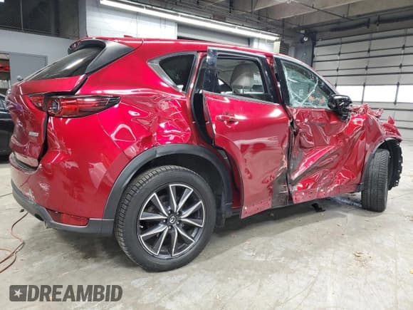 ✅ 2018 Mazda CX-5 Grand Touring • VIN: JM3KFBDM8J0300295 • Лот: 82679295. Опубликован ранее на Copart с пробегом 80 838 миль. Бесплатный доступ к архиву аукционных продаж из США и подробный отчёт об истории автомобиля на DreamBid. Изображение 3.