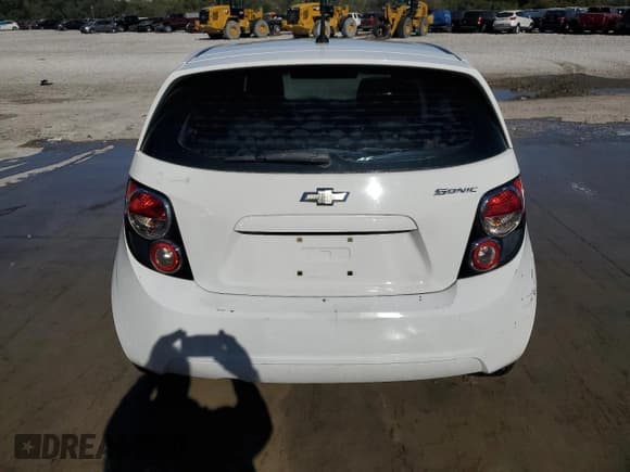 ✅ 2013 Chevrolet Sonic LS • VIN: 1G1JA6SH7D4105505 • Lot: 89711575. Listed on Copart with 153,409 mi. Free auction sales archive from the USA and detailed vehicle history report at DreamBid. Image 6.