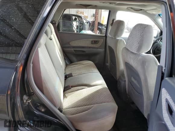 2005 Hyundai Tucson GLS with VIN KM8JN12D85U062222, listed as a Copart auction lot 77317334 with 192,758 mi miles and Salvage title. Bid and sale history available at DreamBid. Image 11.