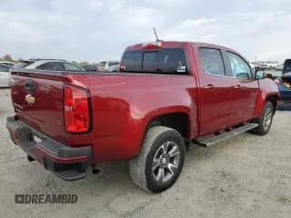 ✅ 2019 Chevrolet Colorado 2WD LT • VIN: 1GCGSCEN9K1180414 • Лот: 77430314. Опубликован ранее на Copart с пробегом 38 744 миль. Бесплатный доступ к архиву аукционных продаж из США и подробный отчёт об истории автомобиля на DreamBid. Изображение 3.