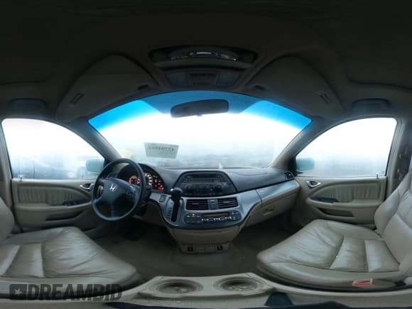 ✅ 2005 Honda Odyssey EX-L • VIN: 5FNRL38655B411556 • Lot: 43704042. Listed on IAAI with 205,713 mi. Free auction sales archive from the USA and detailed vehicle history report at DreamBid. Image 18.