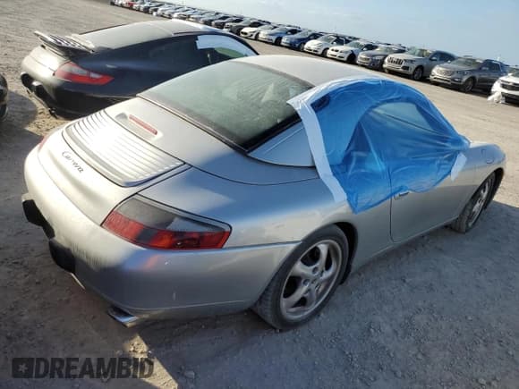 ✅ 2000 Porsche 911 • VIN: WP0CA2993YS652604 • Лот: 77029404. Опубликован ранее на Copart с пробегом Не указан. Бесплатный доступ к архиву аукционных продаж из США и подробный отчёт об истории автомобиля на DreamBid. Изображение 3.