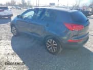 ✅ 2015 Kia Sportage LX • VIN: KNDPBCAC2F7757761 • Lot: 43718084. Listed on IAAI with 129,391 mi. Free auction sales archive from the USA and detailed vehicle history report at DreamBid. Image 3.