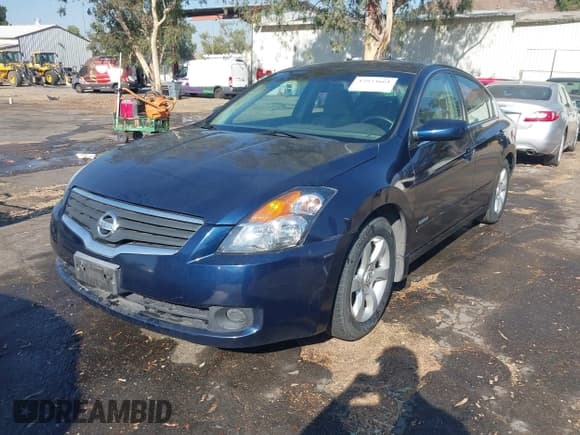 ✅ 2007 Nissan Altima Hybrid • VIN: 1N4CL21E97C186081 • Лот: 42923661. Опубликован ранее на IAAI с пробегом 227 781 миль. Бесплатный доступ к архиву аукционных продаж из США и подробный отчёт об истории автомобиля на DreamBid. Изображение 2.