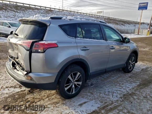✅ 2016 Toyota RAV4 XLE • VIN: 2T3RFREV8GW467574 • Lot: 94520935. Listed on Copart with 143,471 mi. Free auction sales archive from the USA and detailed vehicle history report at DreamBid. Image 3.