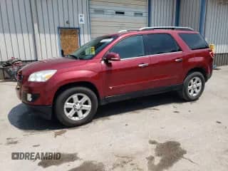 2008 Saturn Outlook XR z VIN 5GZER237X8J153005, wystawiony jako Copart lot #67297615 z przebiegiem 138 956 mil mil oraz Szkoda całkowita • Salvage title. Historia ofert i sprzedaży dostępna na DreamBid. Obrazek 1.