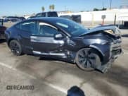 ✅ 2024 Tesla Model 3 • VIN: 5YJ3E1EA4RF865803 • Lot: 87307385. Listed on Copart with 32,937 mi. Free auction sales archive from the USA and detailed vehicle history report at DreamBid. Image 4.