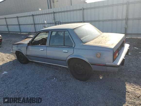 ✅ 1984 Chevrolet Cavalier • VIN: 1G1AD69P3EJ312352 • Lot: 81424985. Listed on Copart with 517,098 mi. Free auction sales archive from the USA and detailed vehicle history report at DreamBid. Image 2.