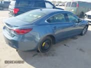 ✅ 2014 Mazda 6 i Grand Touring • VIN: JM1GJ1W62E1126147 • Lot: 43697289. Listed on IAAI with 140,014 mi. Free auction sales archive from the USA and detailed vehicle history report at DreamBid. Image 4.