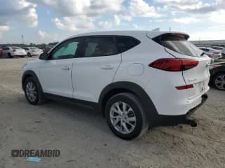 ✅ 2019 Hyundai Tucson SE • VIN: KM8J23A49KU971488 • Лот: 91629145. Опубликован ранее на Copart с пробегом 143 141 миль. Бесплатный доступ к архиву аукционных продаж из США и подробный отчёт об истории автомобиля на DreamBid. Изображение 2.