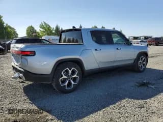 ✅ 2023 Rivian R1T Adventure • VIN: 7FCTGBAA0PN025046 • Lot: 62502274. Listed on Copart with 1,385 mi. Free auction sales archive from the USA and detailed vehicle history report at DreamBid. Image 3.