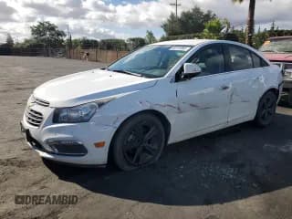 ✅ 2015 Chevrolet Cruze LT • VIN: 1G1PE5SB9F7190157 • Lot: 82216965. Listed on Copart with 143,860 mi. Free auction sales archive from the USA and detailed vehicle history report at DreamBid. Image 1.