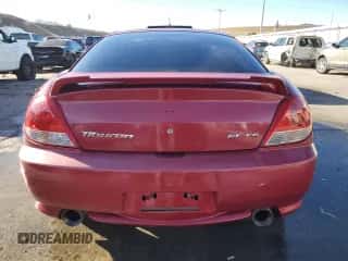 2006 Hyundai Tiburon GT z VIN KMHHN65F16U207031, wystawiony jako Copart lot #83851394 z przebiegiem 119 625 mil mil oraz Szkoda całkowita • Salvage title. Historia ofert i sprzedaży dostępna na DreamBid. Obrazek 6.