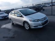 ✅ 2011 Honda Insight EX • VIN: JHMZE2H73BS012123 • Lot: 43680264. Listed on IAAI with 93,938 mi. Free auction sales archive from the USA and detailed vehicle history report at DreamBid. Image 1.