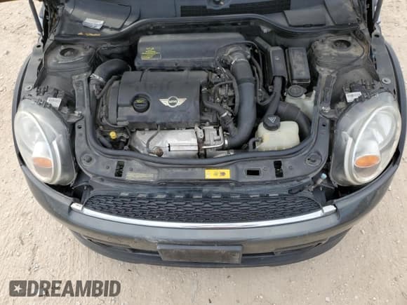 ✅ 2014 MINI Coupe S • VIN: WMWSX3C59ET409209 • Lot: 78886564. Wystawiony na Copart z przebiegiem 118 632 mil. Bezpłatny archiwum sprzedaży aukcyjnych z USA i szczegółowy raport historii pojazdu na DreamBid. Zdjęcie 11.