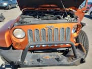 ✅ 2011 Jeep Wrangler Sahara • VIN: 1J4GA5D18BL576541 • Lot: 87415305. Listed on Copart with 142,246 mi. Free auction sales archive from the USA and detailed vehicle history report at DreamBid. Image 12.