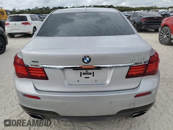 ✅ 2013 BMW 7 Series 750i xDrive • VIN: WBAYB6C52DD223708 • Лот: 53602985. Опубликован ранее на Copart с пробегом 161 139 миль. Бесплатный доступ к архиву аукционных продаж из США и подробный отчёт об истории автомобиля на DreamBid. Изображение 6.