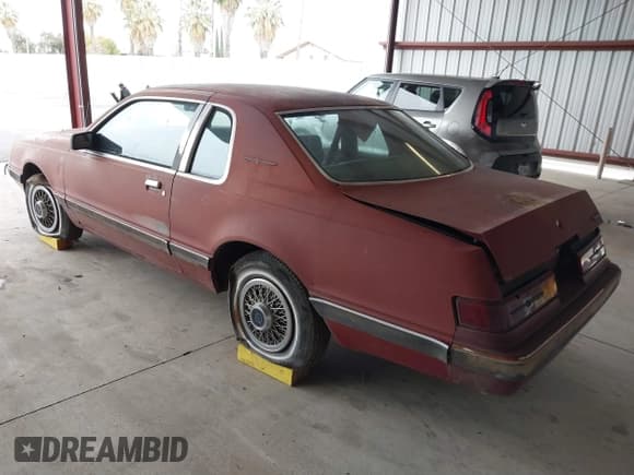 ✅ 1984 Ford Thunderbird • VIN: 1FABP4630EA111572 • Lot: 41569309. Listed on IAAI with 7,919 mi. Free auction sales archive from the USA and detailed vehicle history report at DreamBid. Image 3.