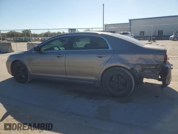 ✅ 2012 Chevrolet Malibu 1LS • VIN: 1G1ZB5E02CF275659 • Lot: 82084484. Listed on Copart with 181,421 mi. Free auction sales archive from the USA and detailed vehicle history report at DreamBid. Image 2.