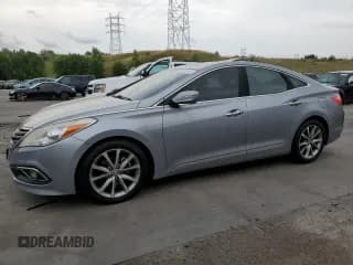 ✅ 2016 Hyundai Azera • VIN: KMHFG4JG2GA506616 • Лот: 65019115. Опубликован ранее на Copart с пробегом 93 770 миль. Бесплатный доступ к архиву аукционных продаж из США и подробный отчёт об истории автомобиля на DreamBid. Изображение 1.