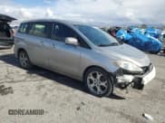 ✅ 2010 Mazda 5 Touring • VIN: JM1CR2W35A0382981 • Лот: 92050545. Опубликован ранее на Copart с пробегом 126 939 миль. Бесплатный доступ к архиву аукционных продаж из США и подробный отчёт об истории автомобиля на DreamBid. Изображение 4.