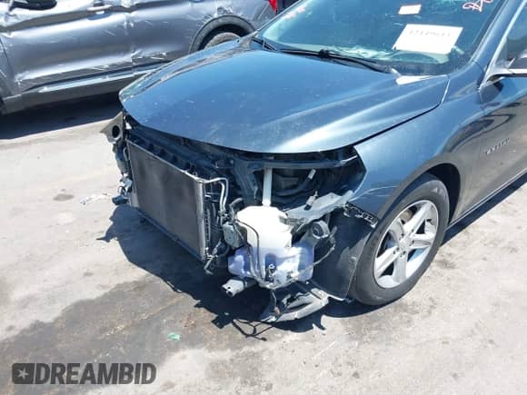 2019 Chevrolet Malibu LS with VIN 1G1ZC5ST3KF104347, listed as a IAAI auction lot 42449611 with 136,527 mi miles and . Bid and sale history available at DreamBid. Image 6.