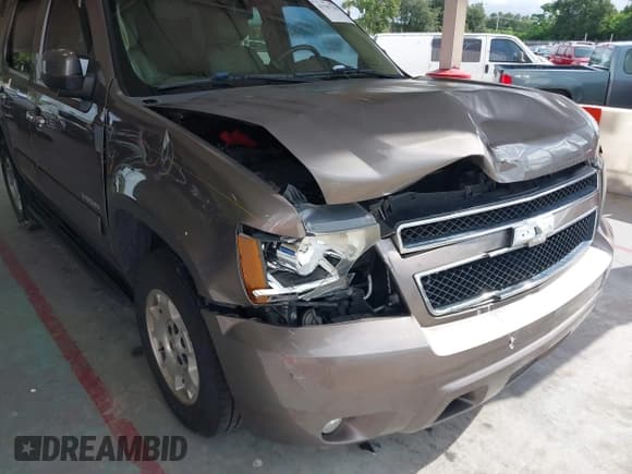 ✅ 2014 Chevrolet Tahoe LT • VIN: 1GNSCBE09ER193327 • Lot: 43187109. Listed on IAAI with 168,647 mi. Free auction sales archive from the USA and detailed vehicle history report at DreamBid. Image 6.