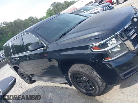 2016 Chevrolet Tahoe Commercial with VIN 1GNSKDEC9GR351872, listed as a IAAI auction lot 42239404 with 144,693 mi miles and . Bid and sale history available at DreamBid. Image 13.