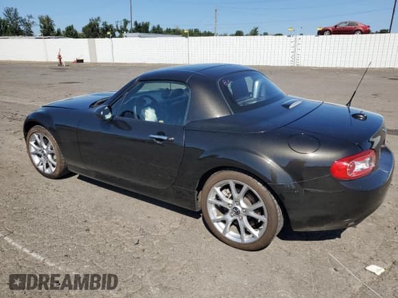 ✅ 2013 Mazda MX-5 Miata Grand Touring • VIN: JM1NC2PFXD0227978 • Лот: 63883604. Опубликован ранее на Copart с пробегом 31 905 миль. Бесплатный доступ к архиву аукционных продаж из США и подробный отчёт об истории автомобиля на DreamBid. Изображение 2.