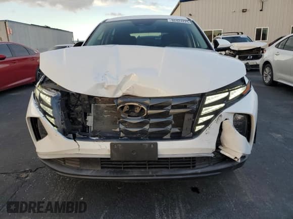 ✅ 2022 Hyundai Tucson SE • VIN: 5NMJA3AE5NH034388 • Lot: 92424225. Listed on Copart with 58,281 mi. Free auction sales archive from the USA and detailed vehicle history report at DreamBid. Image 5.