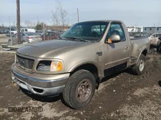 ✅ 1999 Ford F-150 • VIN: 2FTRF08L4XCA23787 • Lot: 54982305. Wystawiony na Copart z przebiegiem 188 594 mil. Bezpłatny archiwum sprzedaży aukcyjnych z USA i szczegółowy raport historii pojazdu na DreamBid. Zdjęcie 1.
