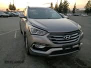 ✅ 2018 Hyundai Santa Fe 2.4L • VIN: 5NMZU3LB0JH056211 • Lot: 93690255. Listed on Copart with 75,202 mi. Free auction sales archive from the USA and detailed vehicle history report at DreamBid. Image 14.