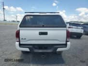 ✅ 2016 Toyota Tacoma SR • VIN: 5TFSX5EN2GX043729 • Lot: 66354905. Listed on Copart with 167,362 mi. Free auction sales archive from the USA and detailed vehicle history report at DreamBid. Image 6.