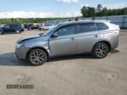 ✅ 2015 Mitsubishi Outlander GT • VIN: JA4JZ4AX2FZ012436 • Lot: 67381154. Listed on Copart with 121,629 mi. Free auction sales archive from the USA and detailed vehicle history report at DreamBid. Image 1.