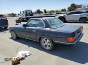 ✅ 1985 Mercedes-Benz SL • VIN: WDB1070461A026562 • Лот: 60354385. Опубликован ранее на Copart с пробегом 33 243 миль. Бесплатный доступ к архиву аукционных продаж из США и подробный отчёт об истории автомобиля на DreamBid. Изображение 2.