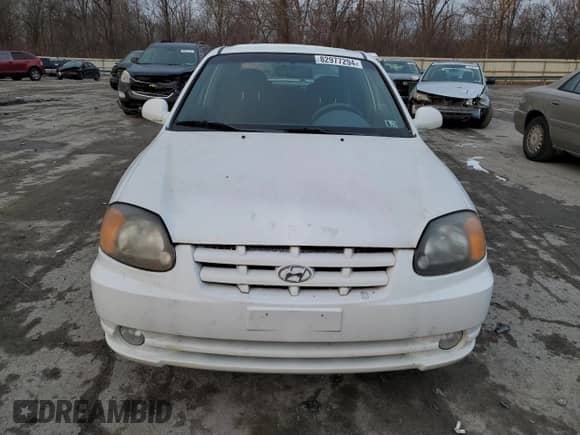 2003 Hyundai Accent GL with VIN KMHCG35C53U258469, listed as a Copart auction lot 82977294 with 99,136 mi miles and Clean title. Bid and sale history available at DreamBid. Image 5.