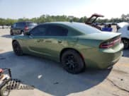 ✅ 2023 Dodge Charger SXT • VIN: 2C3CDXBG3PH674500 • Lot: 69868595. Listed on Copart with 24,205 mi. Free auction sales archive from the USA and detailed vehicle history report at DreamBid. Image 2.