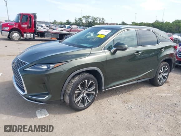 ✅ 2021 Lexus RX 350 • VIN: 2T2HZMAA4MC218599 • Лот: 43273062. Опубликован ранее на IAAI с пробегом 52 253 миль. Бесплатный доступ к архиву аукционных продаж из США и подробный отчёт об истории автомобиля на DreamBid. Изображение 2.