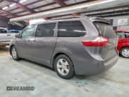 ✅ 2015 Toyota Sienna LE • VIN: 5TDKK3DC6FS583513 • Lot: 94920195. Listed on Copart with 188,720 mi. Free auction sales archive from the USA and detailed vehicle history report at DreamBid. Image 2.