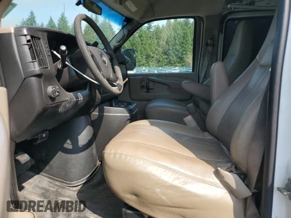 ✅ 2014 Chevrolet Express Cargo • VIN: 1GCWGGCA2E1114957 • Lot: 70565725. Listed on Copart with 141,958 mi. Free auction sales archive from the USA and detailed vehicle history report at DreamBid. Image 7.