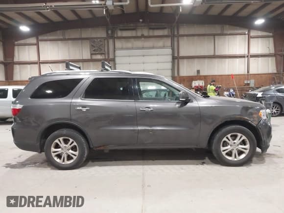 ✅ 2013 Dodge Durango Crew • VIN: 1C4RDJDG3DC690257 • Lot: 43888941. Listed on IAAI with 296,108 mi. Free auction sales archive from the USA and detailed vehicle history report at DreamBid. Image 13.