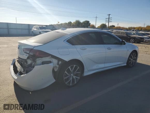✅ 2018 Buick Regal GS • VIN: W04GS6SS4J1094061 • Lot: 89553625. Listed on Copart with 49,649 mi. Free auction sales archive from the USA and detailed vehicle history report at DreamBid. Image 3.