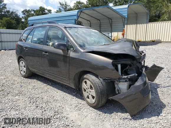 ✅ 2009 Kia Rondo LX • VIN: KNAFG528497255807 • Лот: 72086015. Опубликован ранее на Copart с пробегом Не указан. Бесплатный доступ к архиву аукционных продаж из США и подробный отчёт об истории автомобиля на DreamBid. Изображение 4.