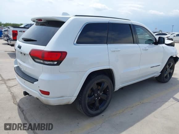 ✅ 2015 Jeep Grand Cherokee Laredo • VIN: 1C4RJEAG7FC104893 • Lot: 43009030. Listed on IAAI with 128,500 mi. Free auction sales archive from the USA and detailed vehicle history report at DreamBid. Image 4.