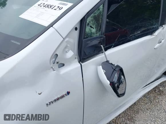 2021 Toyota Prius L Eco with VIN JTDKAMFU6M3137679, listed as a IAAI auction lot 42488129 with 52,414 mi miles and . Bid and sale history available at DreamBid. Image 20.