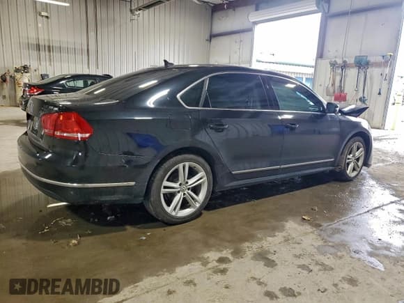 ✅ 2014 Volkswagen Passat SEL Premium • VIN: 1VWCN7A32EC046318 • Lot: 94334875. Listed on Copart with 110,181 mi. Free auction sales archive from the USA and detailed vehicle history report at DreamBid. Image 3.