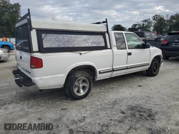 ✅ 2003 Chevrolet S-10 LS • VIN: 1GCCS19X938242711 • Лот: 42184145. Опубликован ранее на Copart с пробегом 121 098 миль. Бесплатный доступ к архиву аукционных продаж из США и подробный отчёт об истории автомобиля на DreamBid. Изображение 3.