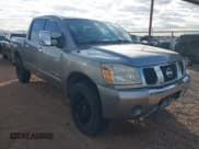 ✅ 2005 Nissan Titan LE • VIN: 1N6BA07A65N573917 • Lot: 43800725. Listed on IAAI with 285,963 mi. Free auction sales archive from the USA and detailed vehicle history report at DreamBid. Image 1.