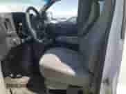 2014 Chevrolet Express Passenger 1LT with VIN 1GNSGCF43E1130315, listed as a Copart auction lot 69969665 with 148,721 mi miles and Salvage title. Bid and sale history available at DreamBid. Image 7.