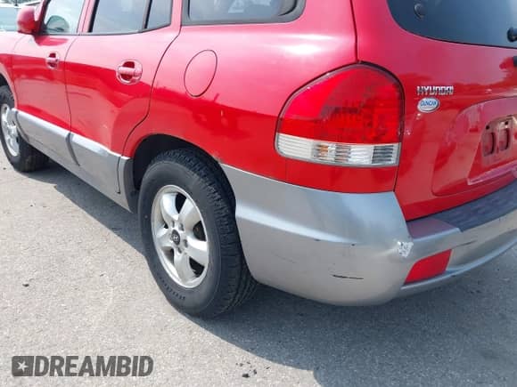 2005 Hyundai Santa Fe GLS z VIN KM8SC73E05U891483, wystawiony jako IAAI lot #42502599 z przebiegiem 177 275 mil mil oraz . Historia ofert i sprzedaży dostępna na DreamBid. Obrazek 14.